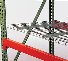 Wire decking being placed into pallet rack