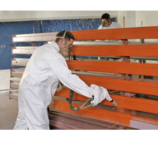 Painting Renewed Beams Going in the Paint Booth