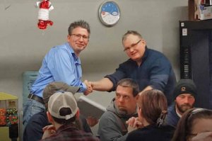 Jason Deiter receives his 20 Years of Service award from Staff Sterner.