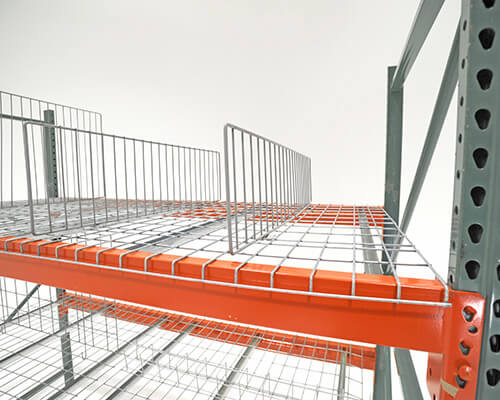Clip-in dividers installed in a pallet rack