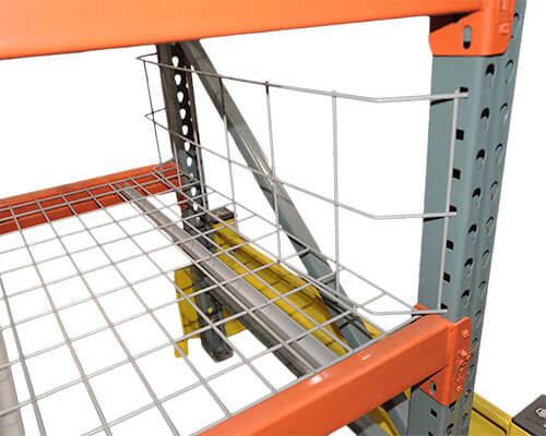 Photo of an upright flue spacer in a pallet rack bay